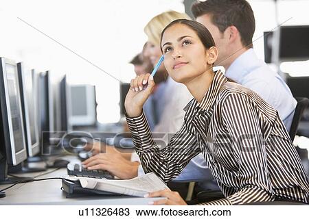 Stock Image - Stock Trader Deep In Thought. Fotosearch