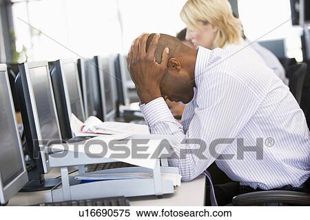 Stock Photography - Stock Trader Looking Frustrated. Fotosearch