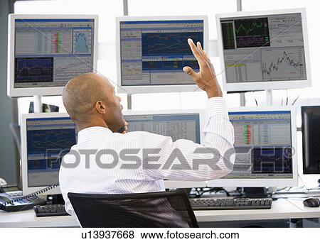 Stock Trader Talking Animatedly On The Phone View Large Photo Image Stock Photo - Stock Trader Talking Animatedly On The Phone. Fotosearch
