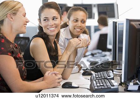 Picture - Stock Trader Team At Work. Fotosearch