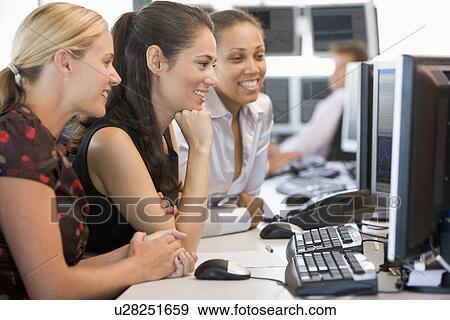 Stock Photo - Stock Trader Team At Work. Fotosearch