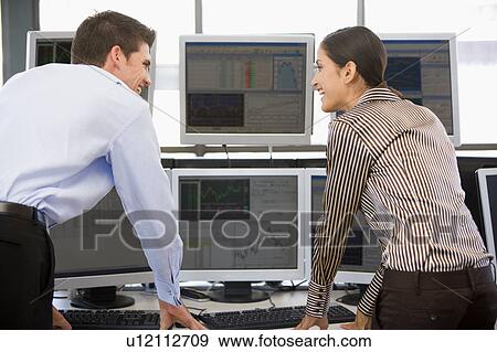 Stock Traders Viewing Monitors View Large Photo Image Stock Photo - Stock Traders Viewing Monitors. Fotosearch