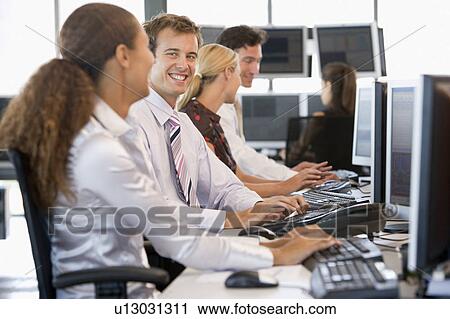 Stock Traders Working At Computers View Large Photo Image Stock Image - Stock Traders Working At Computers. Fotosearch