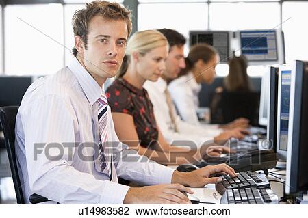 Stock Traders Working At Computers View Large Photo Image Stock Image - Stock Traders Working At Computers. Fotosearch