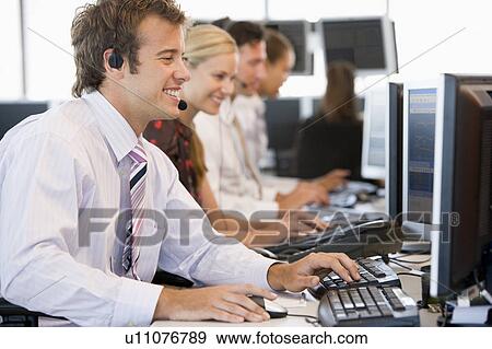 Stock Traders Working At Computers View Large Photo Image Stock Photo - Stock Traders Working At Computers. Fotosearch