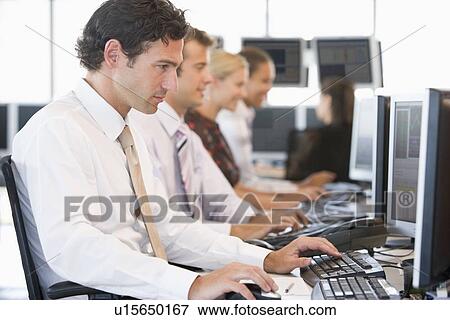 Stock Traders Working At Computers View Large Photo Image Stock Photo - Stock Traders Working At Computers. Fotosearch