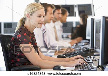 Stock Traders Working At Computers View Large Photo Image Stock Photo - Stock Traders Working At Computers. Fotosearch