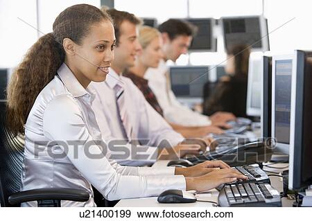 Stock Traders Working At Computers View Large Photo Image Stock Photo - Stock Traders Working At Computers. Fotosearch