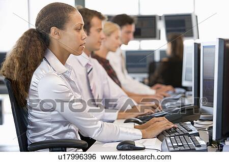 Stock Traders Working At Computers View Large Photo Image Stock Photograph - Stock Traders Working At Computers. Fotosearch