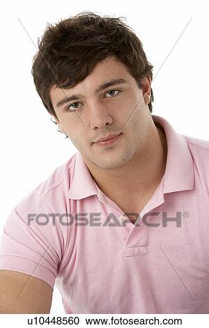 Stock Image - Studio Portrait Of Smiling Teenage Boy. Fotosearch