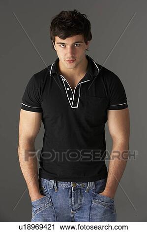Studio Portrait Of Smiling Teenage Boy View Large Photo Image Stock Image - Studio Portrait Of Smiling Teenage Boy. Fotosearch