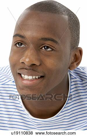 Studio Portrait Of Smiling Teenage Boy View Large Photo Image Stock Photo - Studio Portrait Of Smiling Teenage Boy. Fotosearch