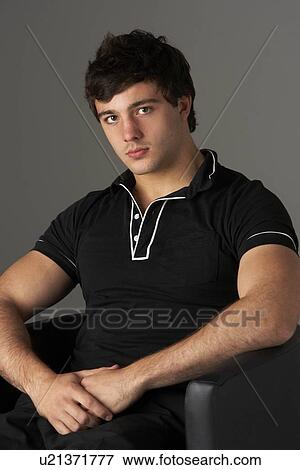 Studio Portrait Of Smiling Teenage Boy View Large Photo Image Stock Photo - Studio Portrait Of Smiling Teenage Boy. Fotosearch