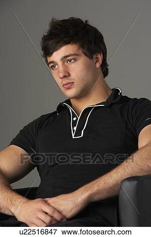 Studio Portrait Of Smiling Teenage Boy View Large Photo Image Stock Photo - Studio Portrait Of Smiling Teenage Boy. Fotosearch