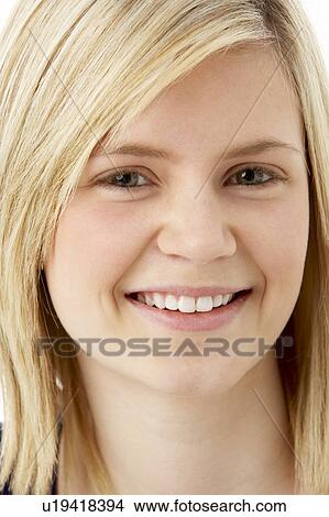 Picture - Studio Portrait Of Smiling Teenage Girl. Fotosearch