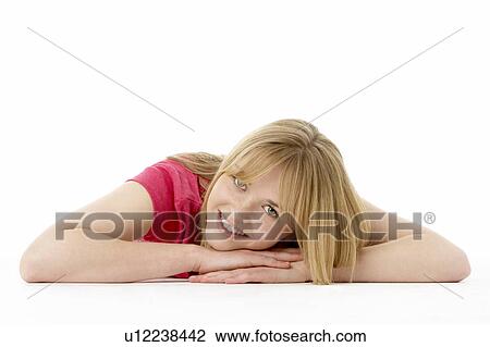 Studio Portrait Of Smiling Teenage Girl View Large Photo Image Stock Image - Studio Portrait Of Smiling Teenage Girl. Fotosearch