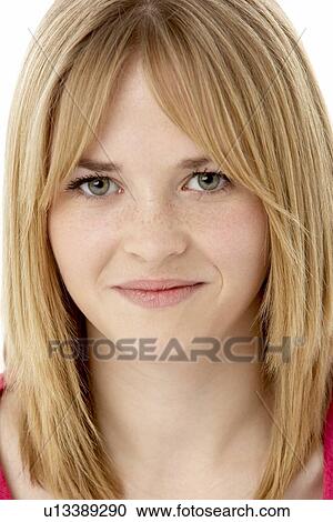 Studio Portrait Of Smiling Teenage Girl View Large Photo Image Stock Image - Studio Portrait Of Smiling Teenage Girl. Fotosearch