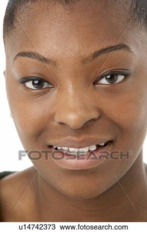 Studio Portrait Of Smiling Teenage Girl View Large Photo Image Stock Image - Studio Portrait Of Smiling Teenage Girl. Fotosearch
