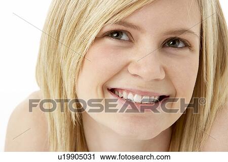 Studio Portrait Of Smiling Teenage Girl View Large Photo Image Stock Image - Studio Portrait Of Smiling Teenage Girl. Fotosearch