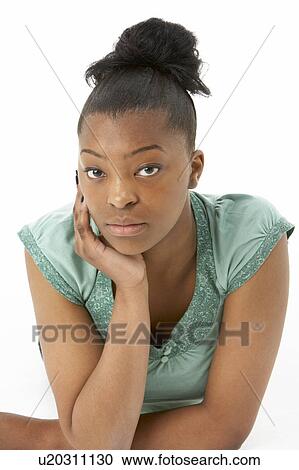 Studio Portrait Of Smiling Teenage Girl View Large Photo Image Stock Image - Studio Portrait Of Smiling Teenage Girl. Fotosearch