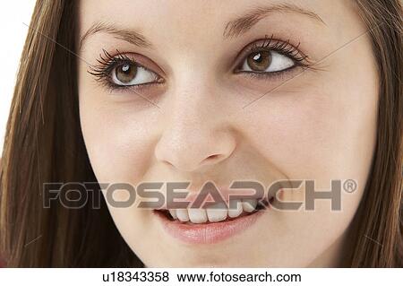 Studio Portrait Of Smiling Teenage Girl View Large Photo Image Stock Photo - Studio Portrait Of Smiling Teenage Girl. Fotosearch