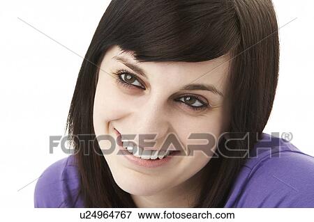 Stock Photo - Studio Portrait Of Smiling Teenage Girl. Fotosearch