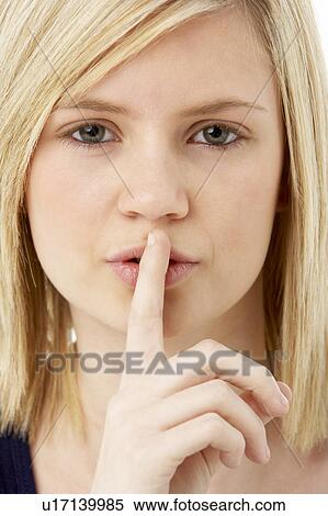 Stock Photography - Studio Portrait Of Surprised Teenage Girl. Fotosearch