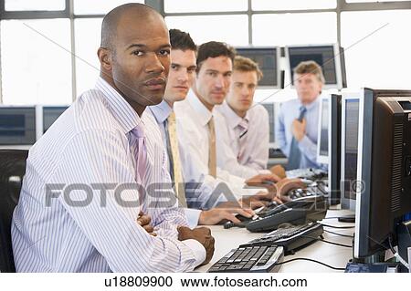 Team Of Stock Traders At Computers View Large Photo Image Stock Image - Team Of Stock Traders At Computers. Fotosearch