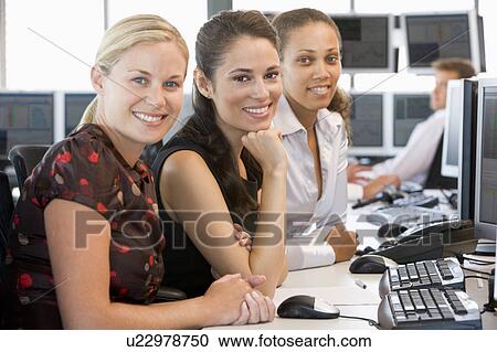 Stock Image - Team Of Stock Traders. Fotosearch