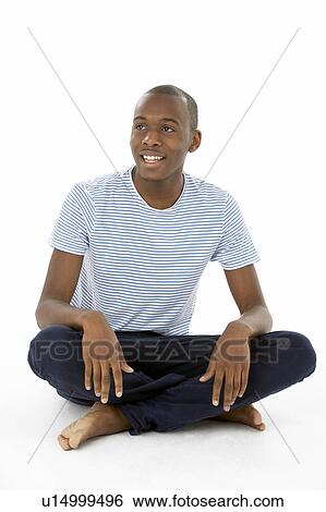 Teenage Boy Sitting In Studio View Large Photo Image Stock Photograph - Teenage Boy Sitting In Studio. Fotosearch