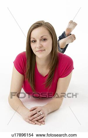 Teenage Girl Laying On Stomach View Large Photo Image Picture - Teenage Girl Laying On Stomach. Fotosearch