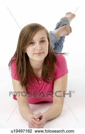 Teenage Girl Laying On Stomach View Large Photo Image Stock Image - Teenage Girl Laying On Stomach. Fotosearch