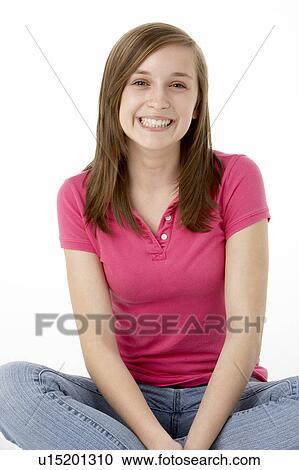 Teenage Girl Sitting In Studio View Large Photo Image Stock Image - Teenage Girl Sitting In Studio. Fotosearch