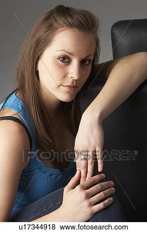 Teenage Girl Sitting In Studio View Large Photo Image Stock Photo - Teenage Girl Sitting In Studio. Fotosearch