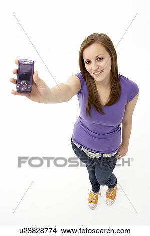Picture - Teenage Girl With Mobile Phone. Fotosearch