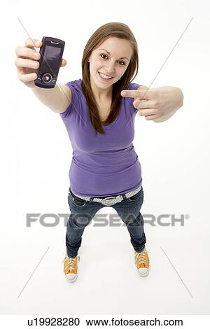 Stock Image - Teenage Girl With Mobile Phone. Fotosearch