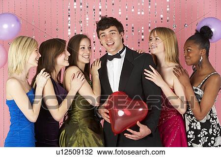 Teenage Girls Looking At Attractive Boy View Large Photo Image Stock Image - Teenage Girls Looking At Attractive Boy. Fotosearch