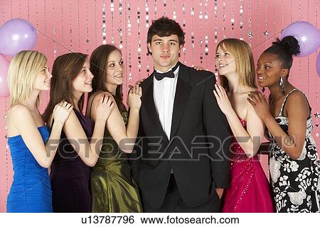 Stock Photograph - Teenage Girls Looking At Attractive Boy. Fotosearch