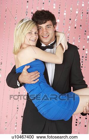 Stock Image - Young Couple Dressed For Party. Fotosearch