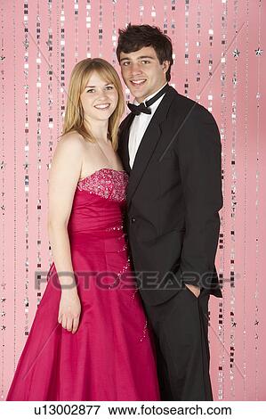Stock Photo - Young Couple Dressed For Party. Fotosearch