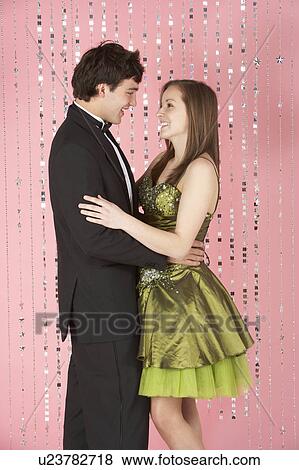 Stock Photo - Young Couple Dressed For Party. Fotosearch