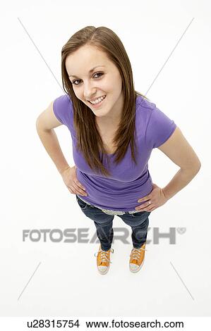 Young Girl Standing In Studio View Large Photo Image Picture - Young Girl Standing In Studio. Fotosearch