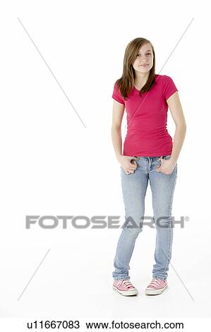 Stock Image - Young Girl Standing In Studio. Fotosearch