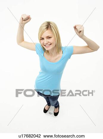 Young Girl Standing In Studio View Large Photo Image Stock Image - Young Girl Standing In Studio. Fotosearch