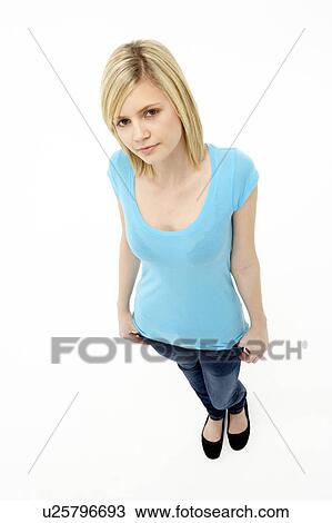 Young Girl Standing In Studio View Large Photo Image Stock Image - Young Girl Standing In Studio. Fotosearch