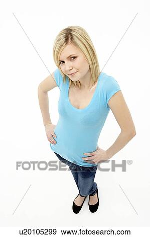Young Girl Standing In Studio View Large Photo Image Stock Photo - Young Girl Standing In Studio. Fotosearch