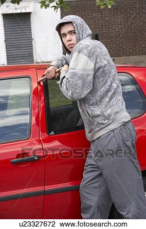 Young Man Breaking Into Car View Large Photo Image Stock Image - Young Man Breaking Into Car. Fotosearch