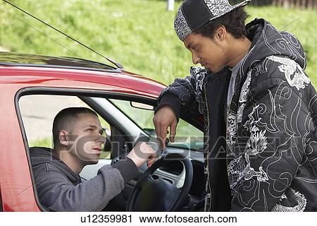 Young Man Dealing Drugs From Car View Large Photo Image Stock Image - Young Man Dealing Drugs From Car. Fotosearch