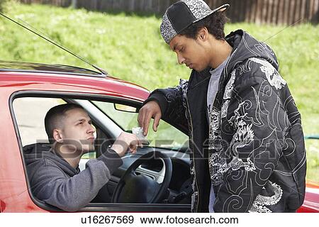 Young Man Dealing Drugs From Car View Large Photo Image Stock Photo - Young Man Dealing Drugs From Car. Fotosearch