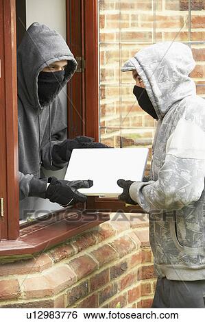 Young Men Breaking Into House View Large Photo Image Stock Photograph - Young Men Breaking Into House. Fotosearch